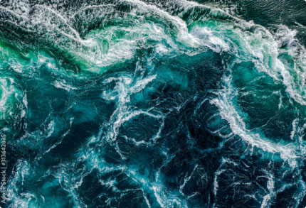 Aerial view of ocean waves crashing