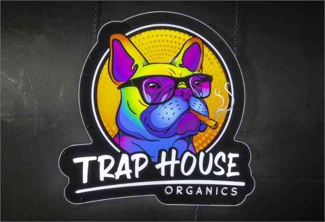 Illuminated hanging sign for Trap House organics