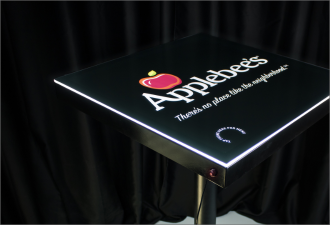 Illuminated table top sign for Applebee's