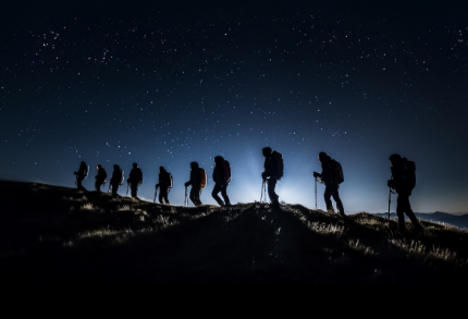 Group of people hiking on a hill