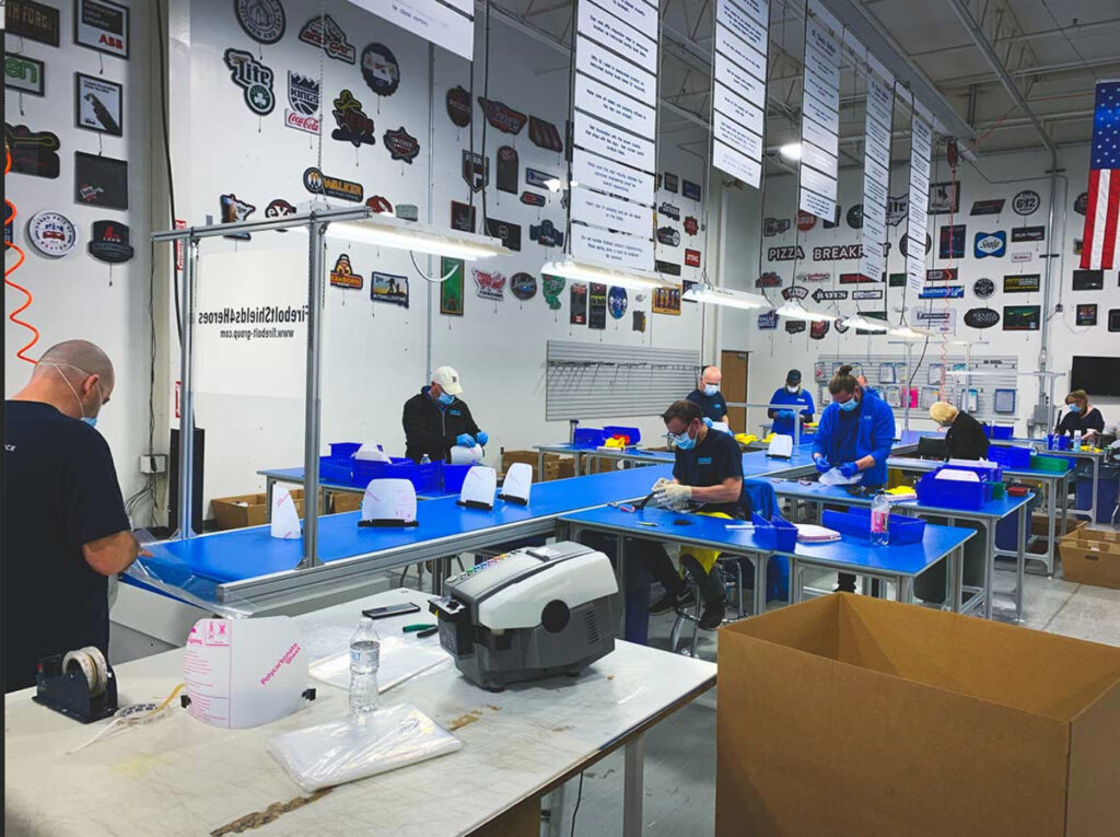 Firebolt engineers in PPE equipment in the lab