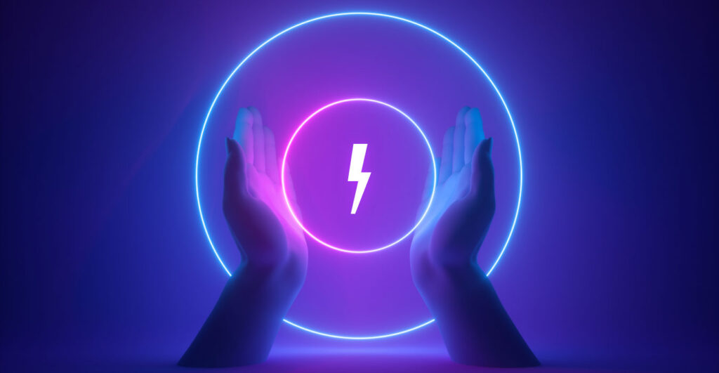 hands holding an illuminated circular Firebolt logo